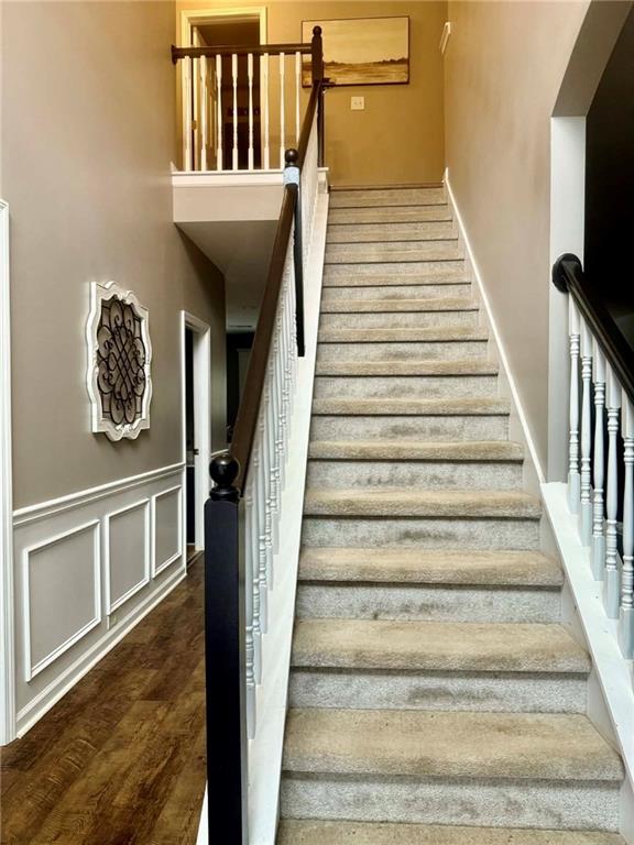 417 Farmwood Way Canton, GA 30115 - Photo 14 of 20 a view of entryway and hall with wooden floor