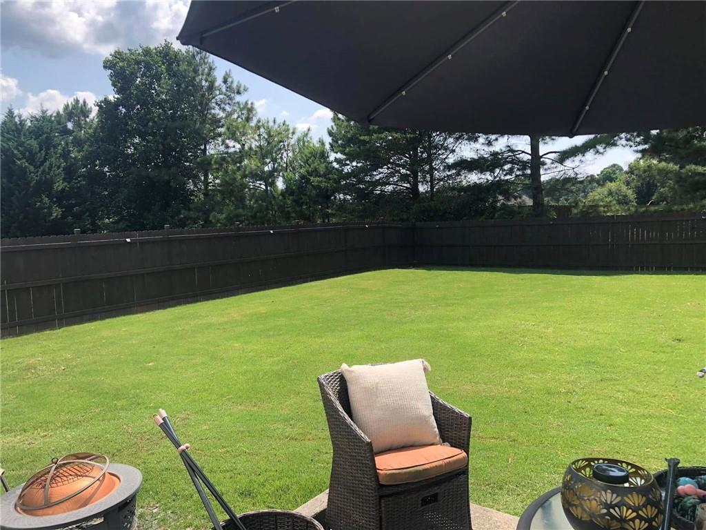 417 Farmwood Way Canton, GA 30115 - Photo 20 of 20 a view of a table and chairs in patio
