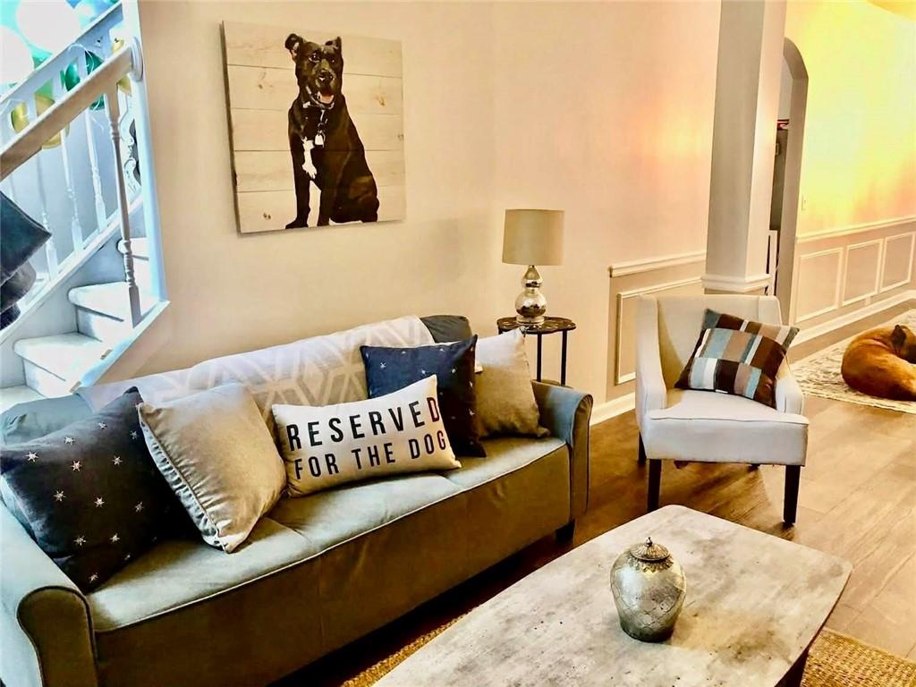 417 Farmwood Way Canton, GA 30115 - Photo 3 of 20 a living room with furniture and a couch