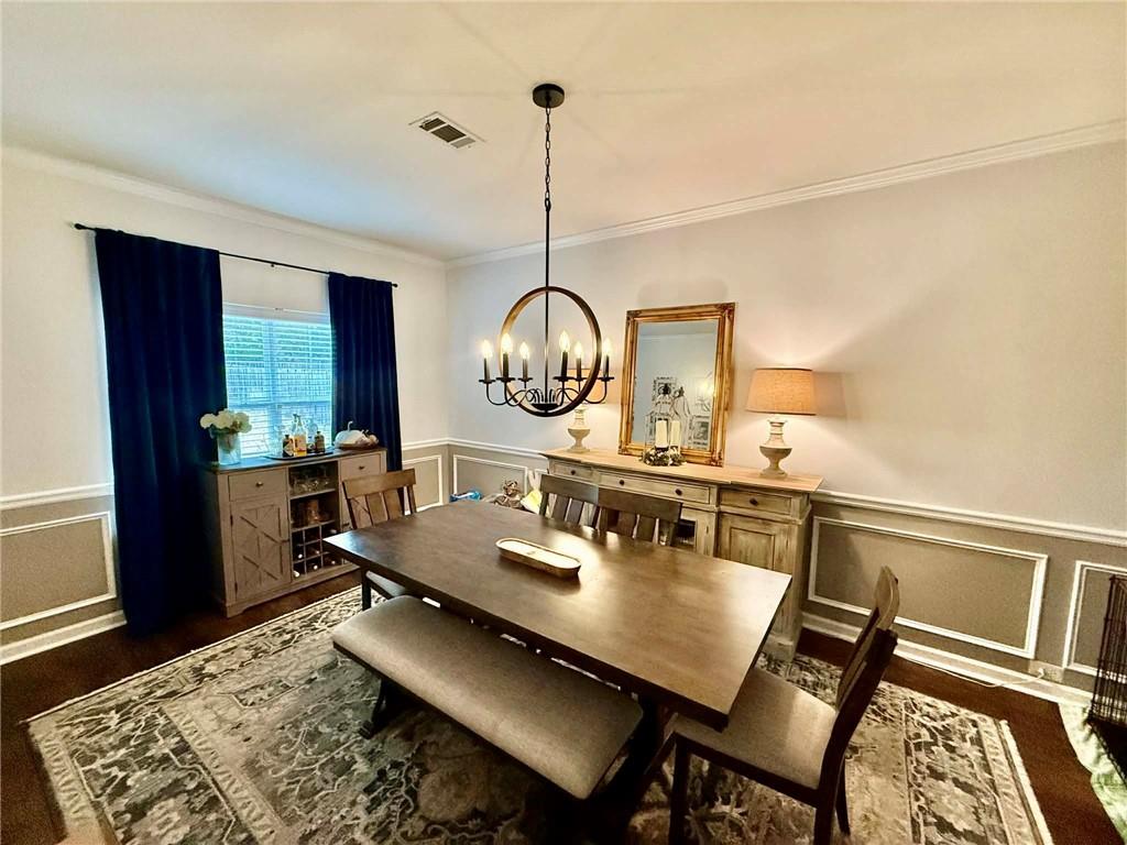 417 Farmwood Way Canton, GA 30115 - Photo 4 of 20 a view of a dining room with furniture