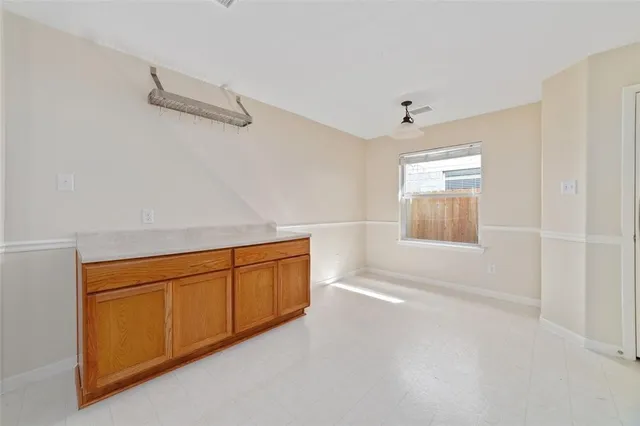 a view of a room with rack on the wall