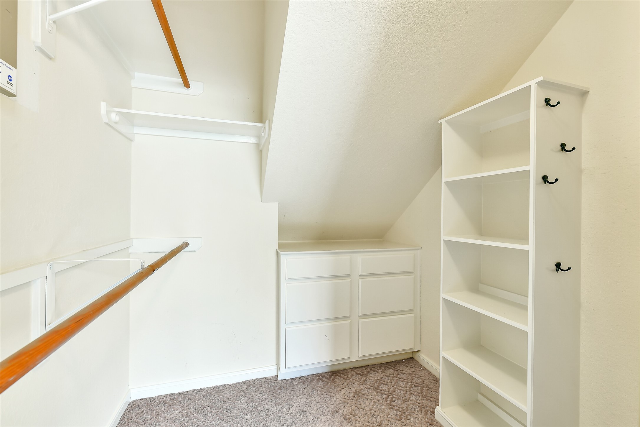 5803 Song Ridge Court Houston, TX 77041 - Photo 25 of 45 a view of an empty walk in closet