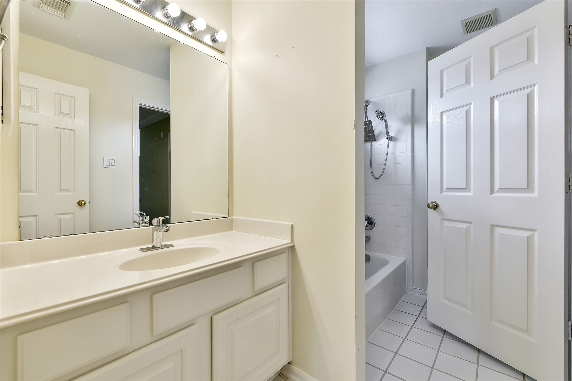 5803 Song Ridge Court Houston, TX 77041 - Photo 33 of 45 a bathroom with a sink and a mirror
