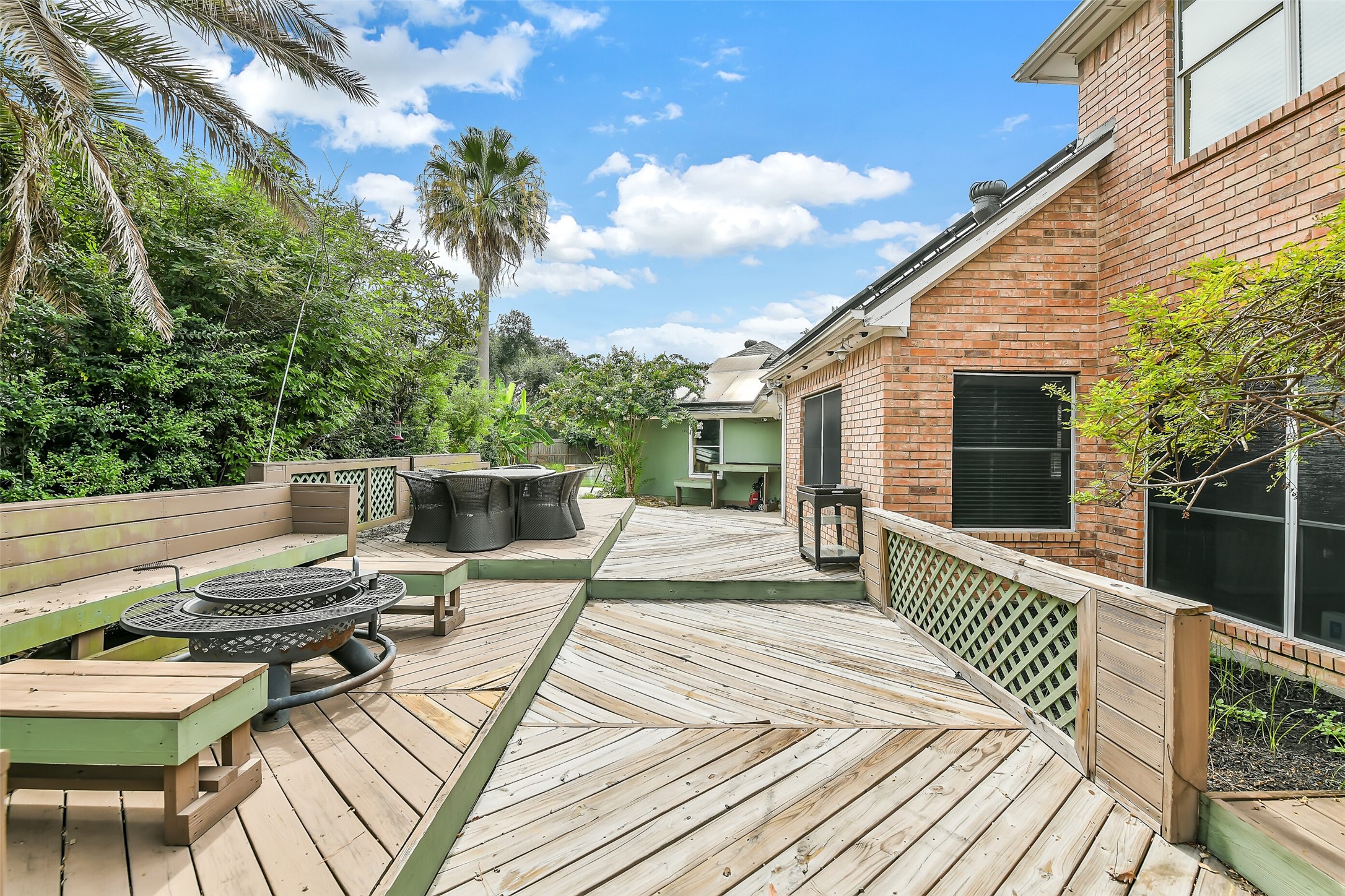 5803 Song Ridge Court Houston, TX 77041 - Photo 38 of 45 a balcony with wooden floor and furniture
