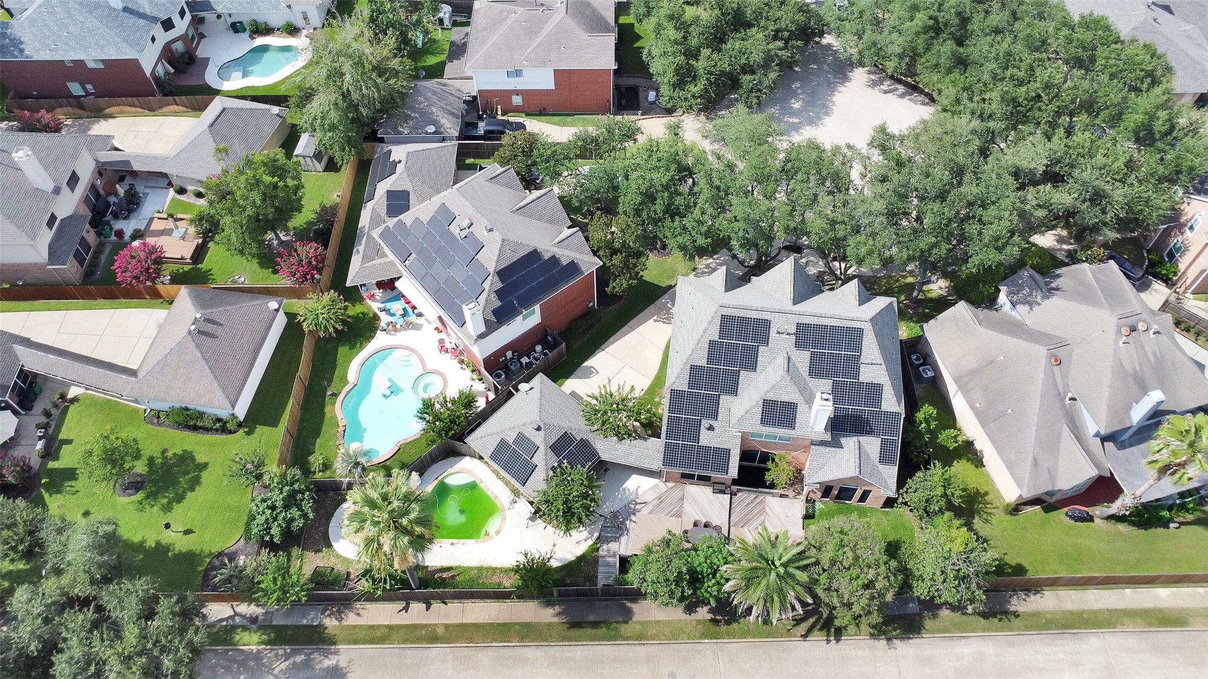 5803 Song Ridge Court Houston, TX 77041 - Photo 42 of 45 an aerial view of multiple houses with yard