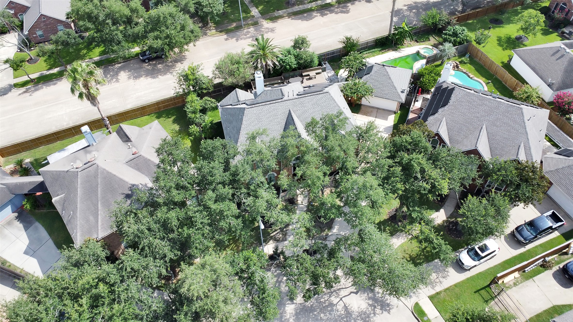 5803 Song Ridge Court Houston, TX 77041 - Photo 45 of 45 an aerial view of a house with garden space and street view