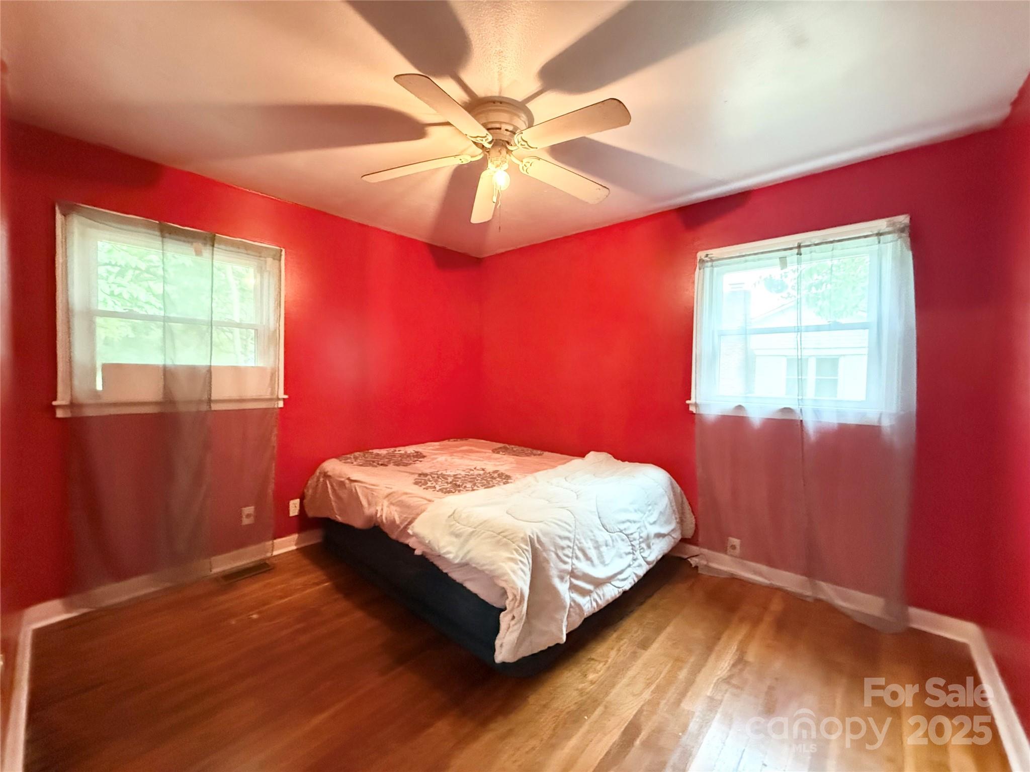 101 Windsor Drive Cheraw, SC 29520 - Photo 16 of 17 a bedroom with a bed and window
