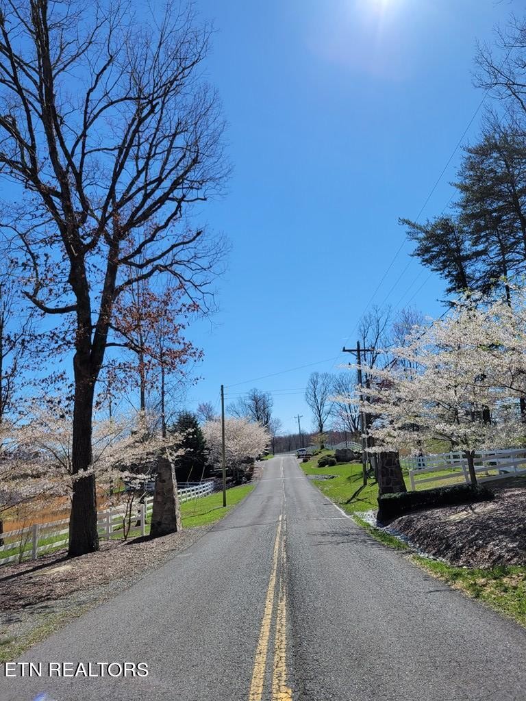 0 Tall Tree Trail Dunlap, TN 37327 - Photo 6 of 18 a view of a street with cars parked