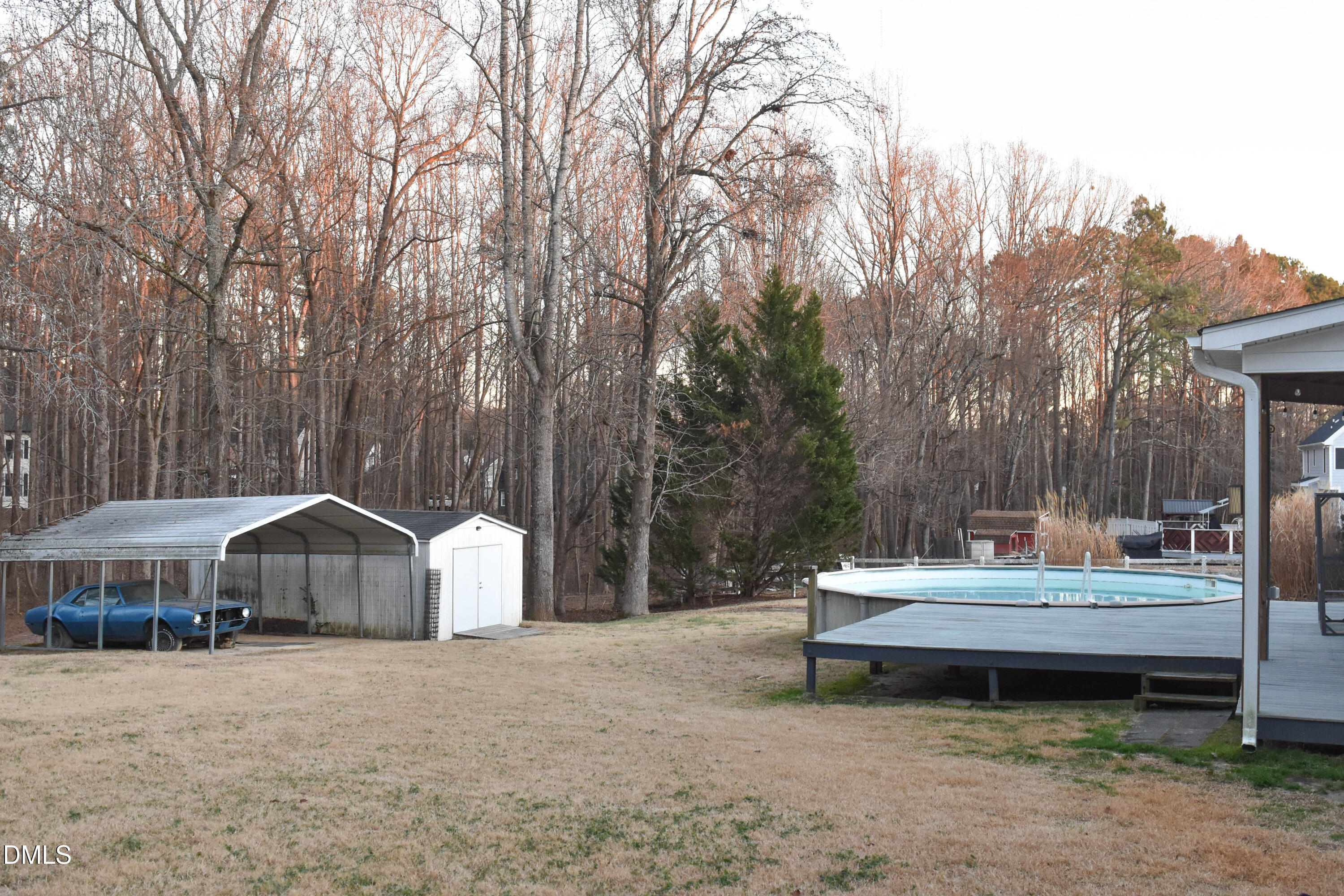 5908 Deep Spring Circle Wake Forest, NC 27587 - Photo 46 of 51 a backyard of a house with table and chairs