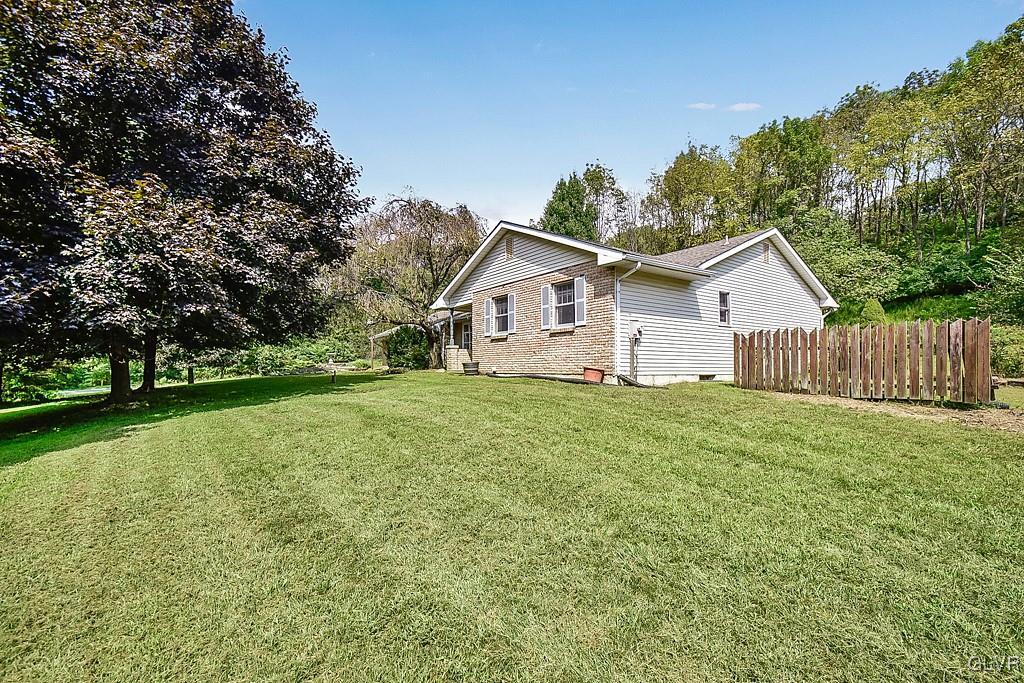 116 South Penn Dixie Road Nazareth, PA 18064 - Photo 5 of 12 a view of a house with backyard and garden