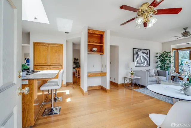 a living room with furniture and a table