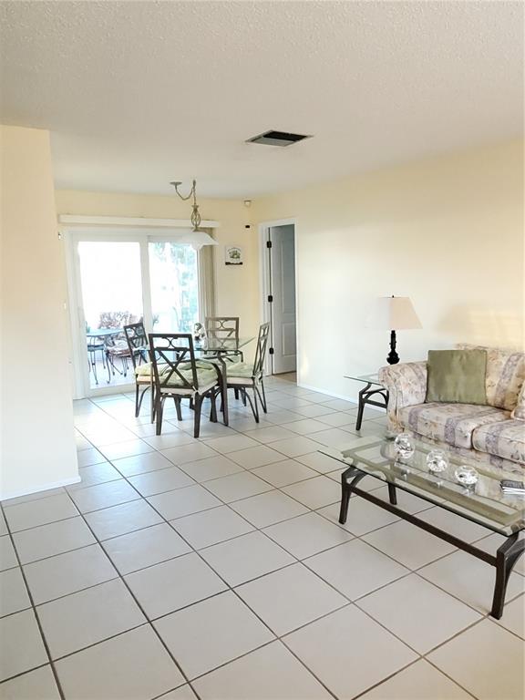 Undisclosed Address Bradenton, FL 34209 - Photo 4 of 38 a living room with furniture