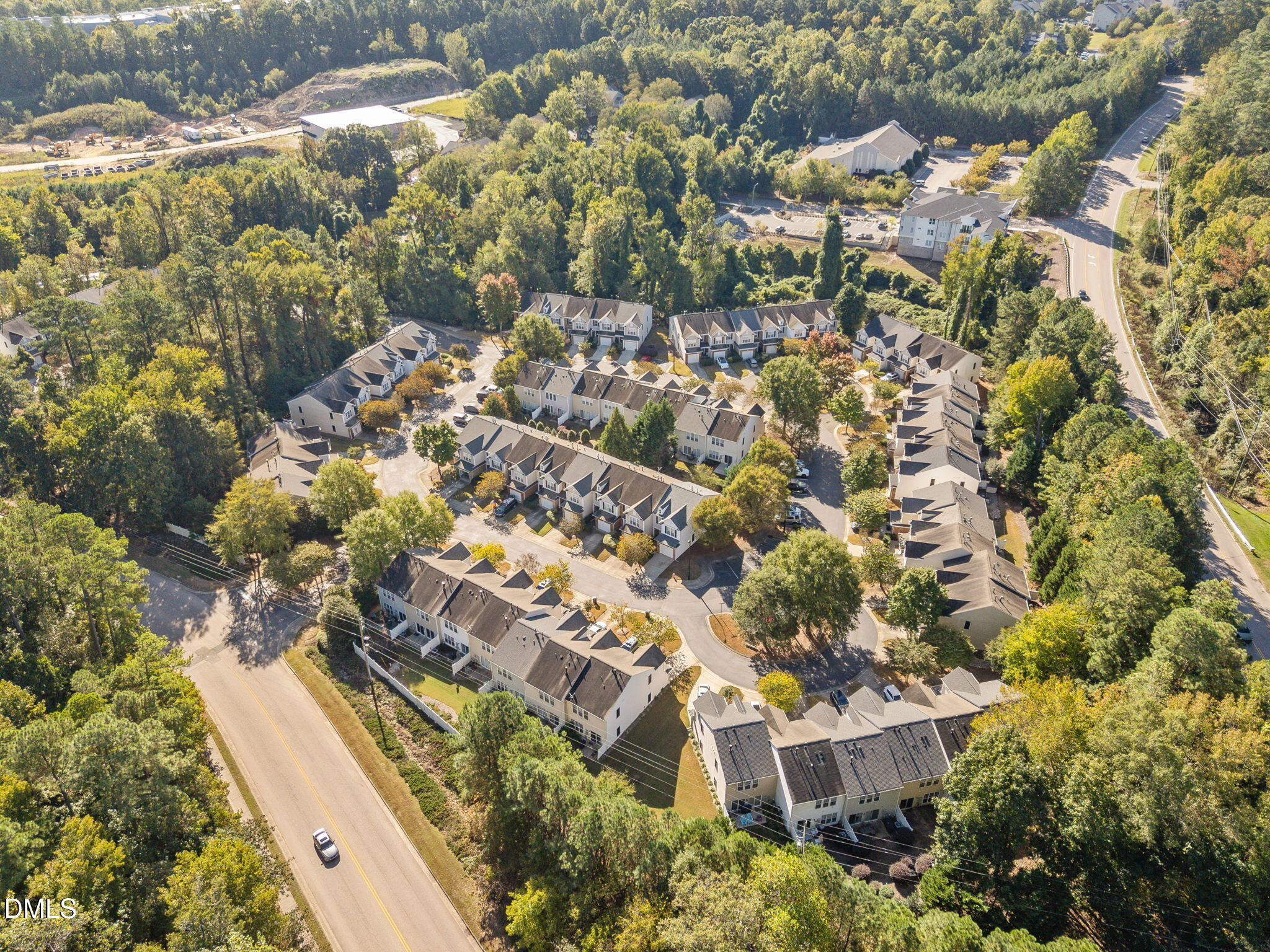 7008 Racine Way Raleigh, NC 27690 - Photo 17 of 36 a view of residential houses with yard