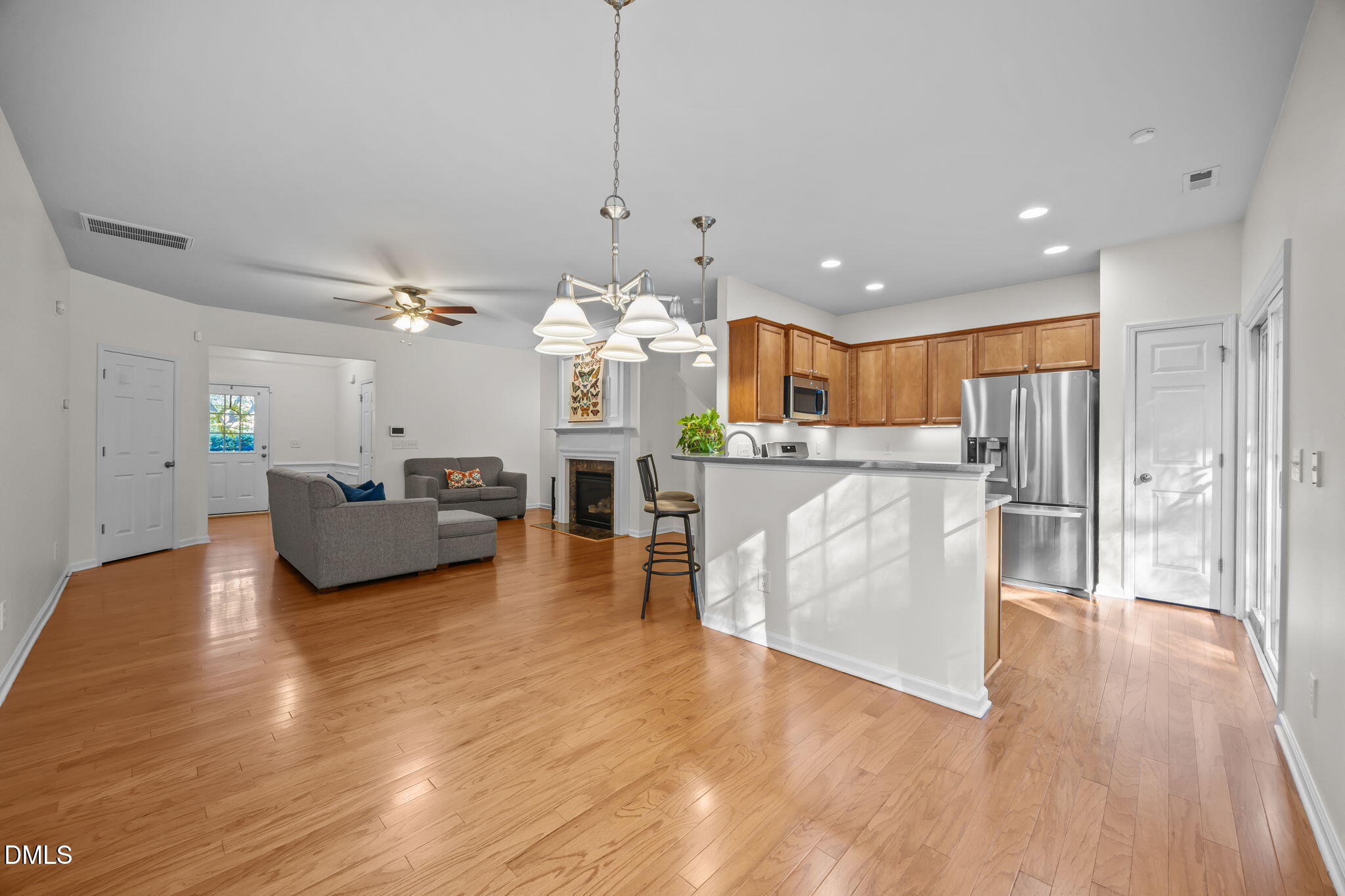 7008 Racine Way Raleigh, NC 27690 - Photo 21 of 36 a view of kitchen with furniture and wooden floor
