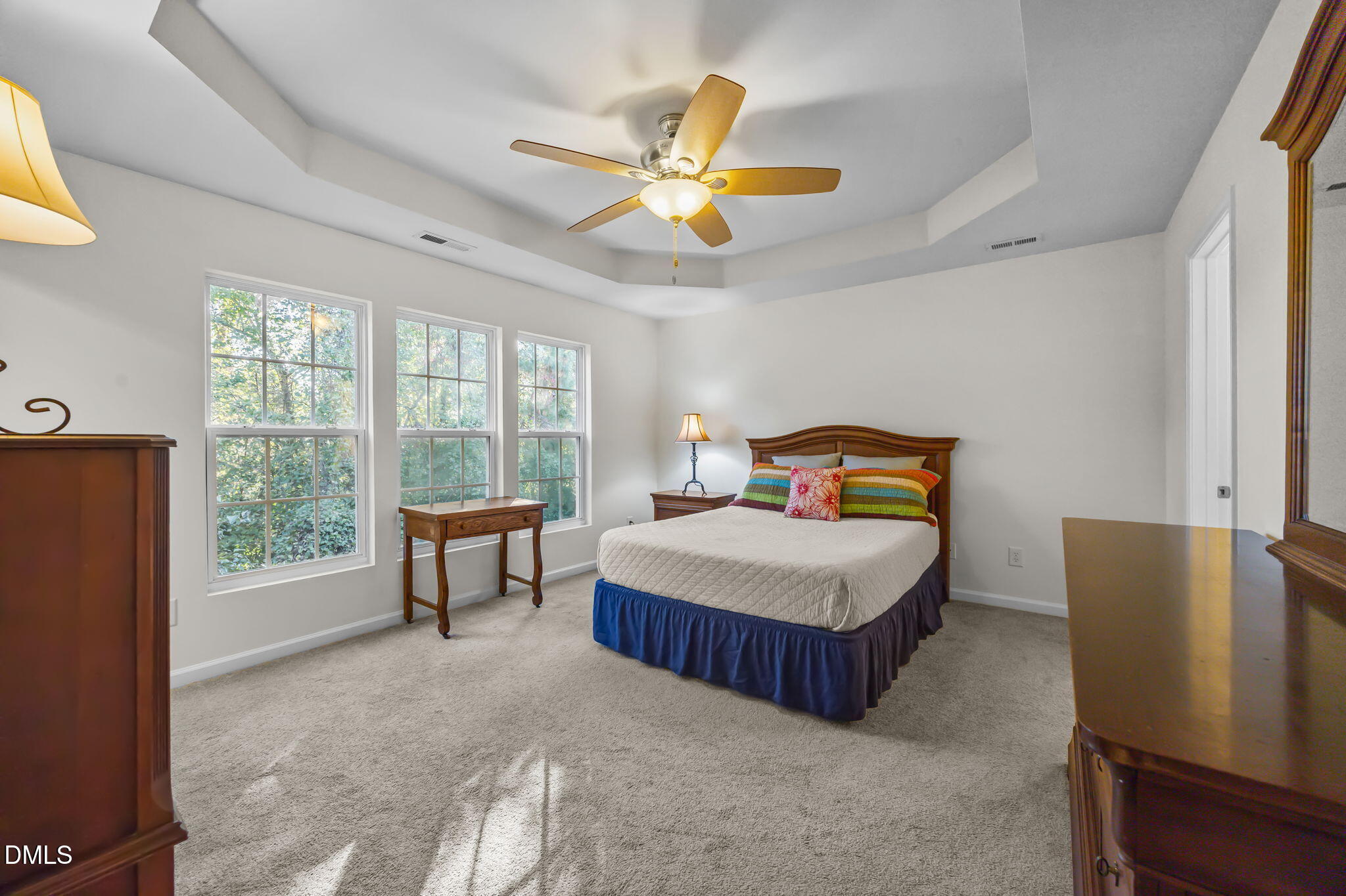 7008 Racine Way Raleigh, NC 27690 - Photo 29 of 36 a bedroom with a bed and a window