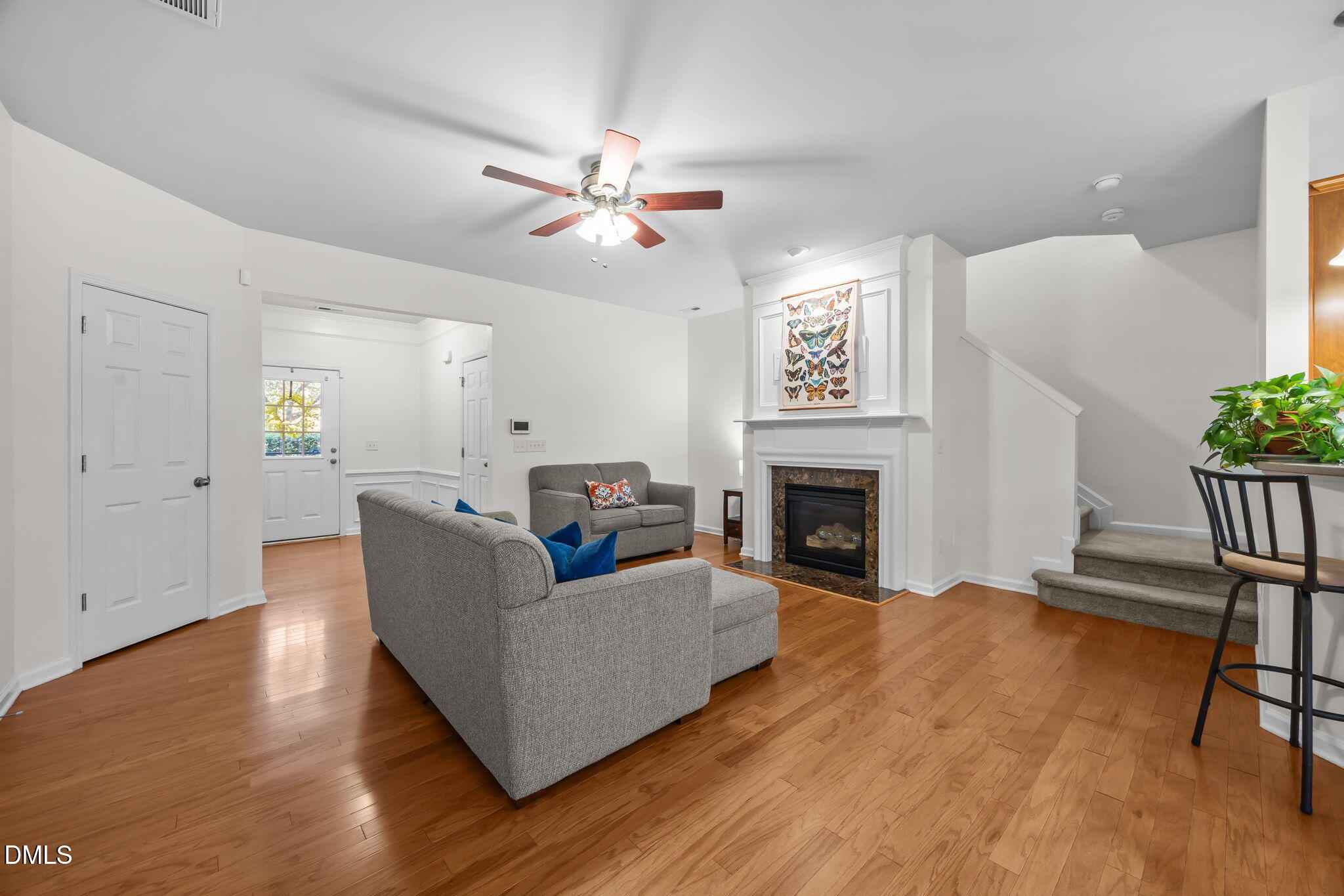 7008 Racine Way Raleigh, NC 27690 - Photo 3 of 36 a living room with furniture and a fireplace