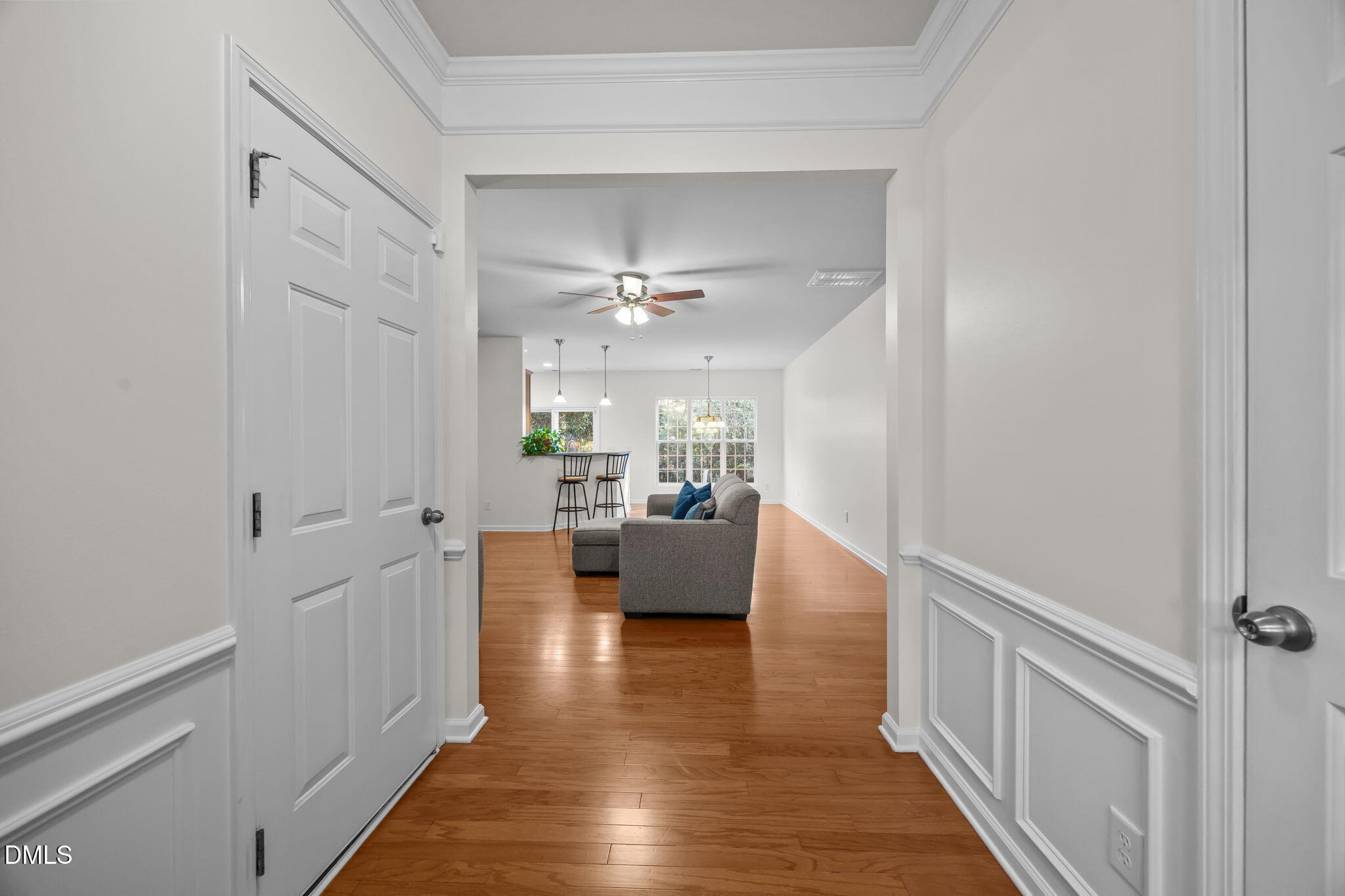 7008 Racine Way Raleigh, NC 27690 - Photo 34 of 36 a living room with furniture and a wooden floor