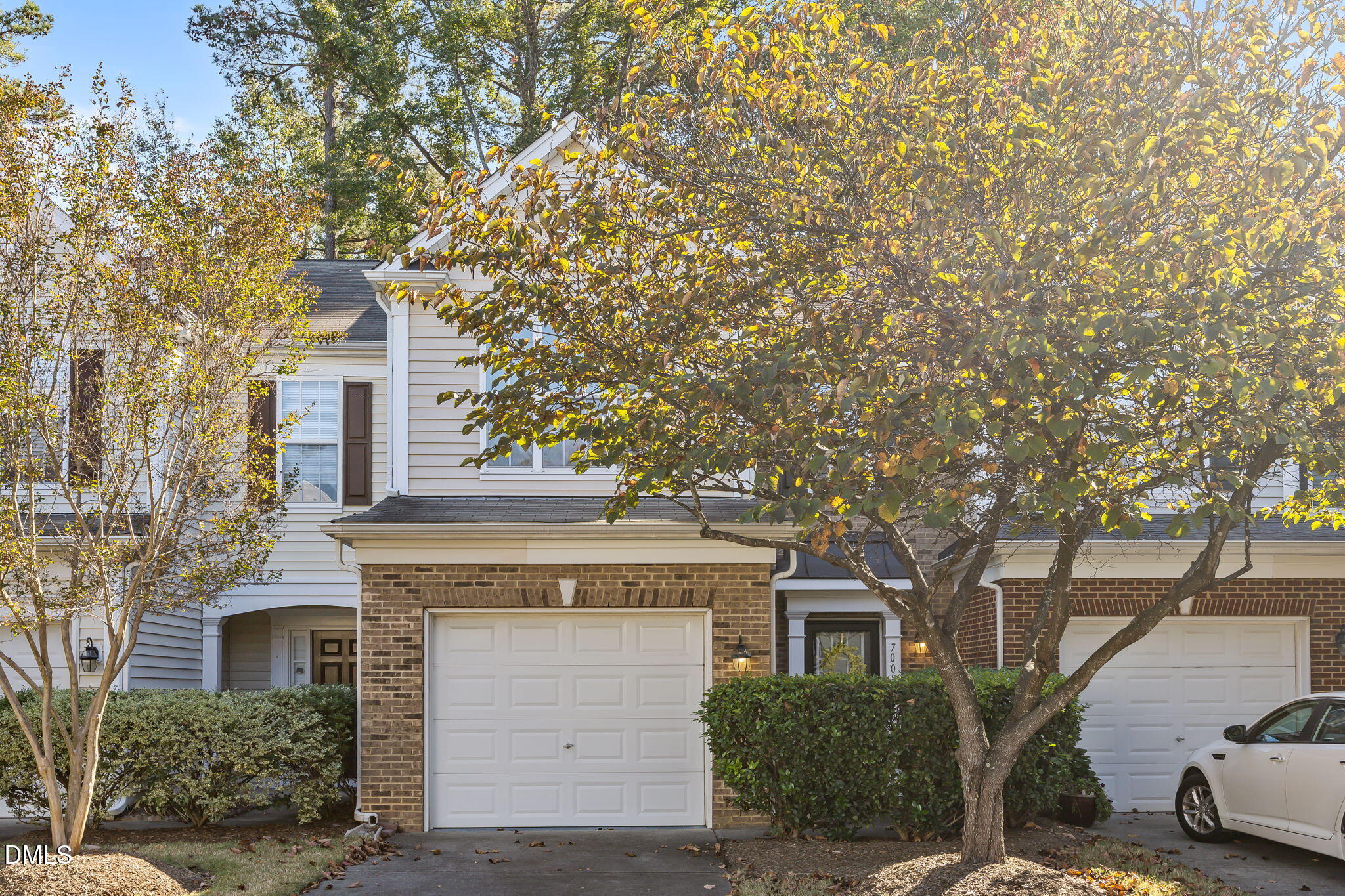 7008 Racine Way Raleigh, NC 27690 - Photo 5 of 36 a front view of a house with a tree