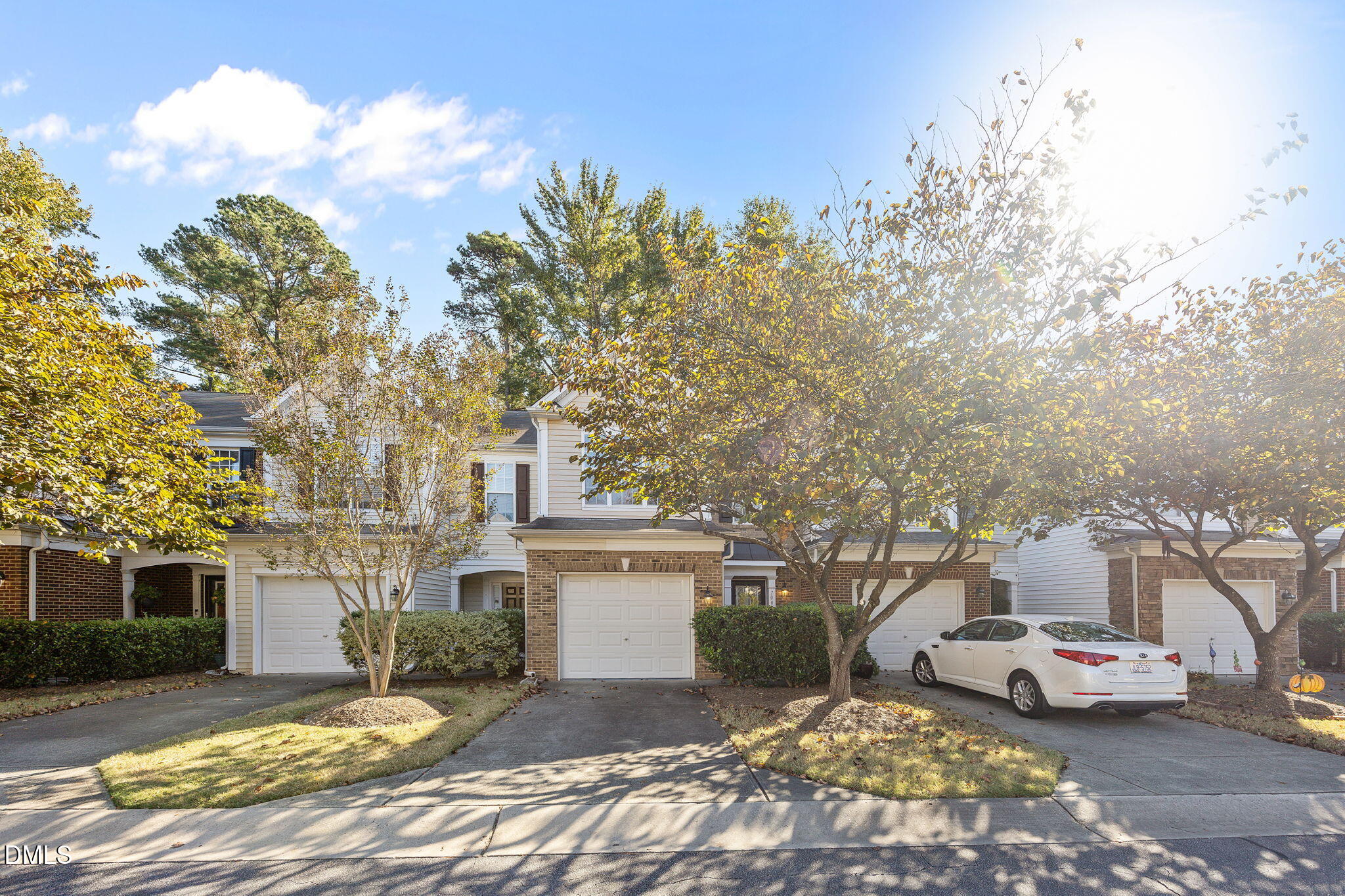 7008 Racine Way Raleigh, NC 27690 - Photo 8 of 36 a view of a house with a cars park