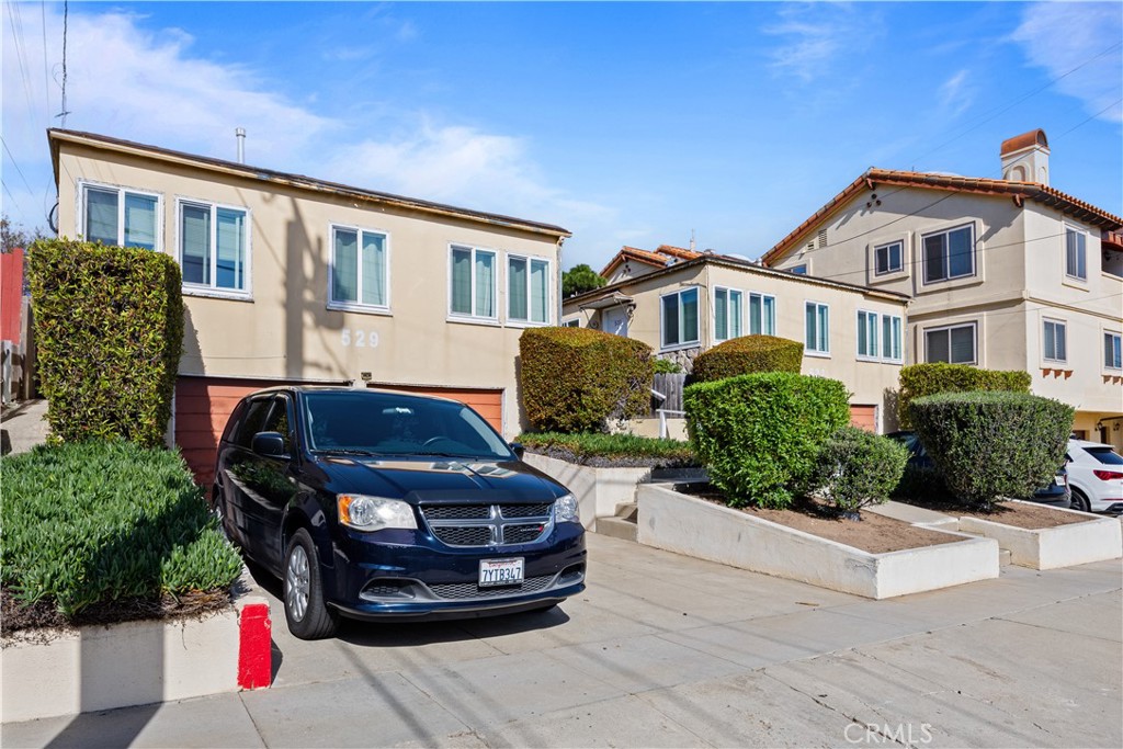 529 East Walnut Avenue El Segundo, CA 90245 - Photo 4 of 27 a house view with a outdoor space