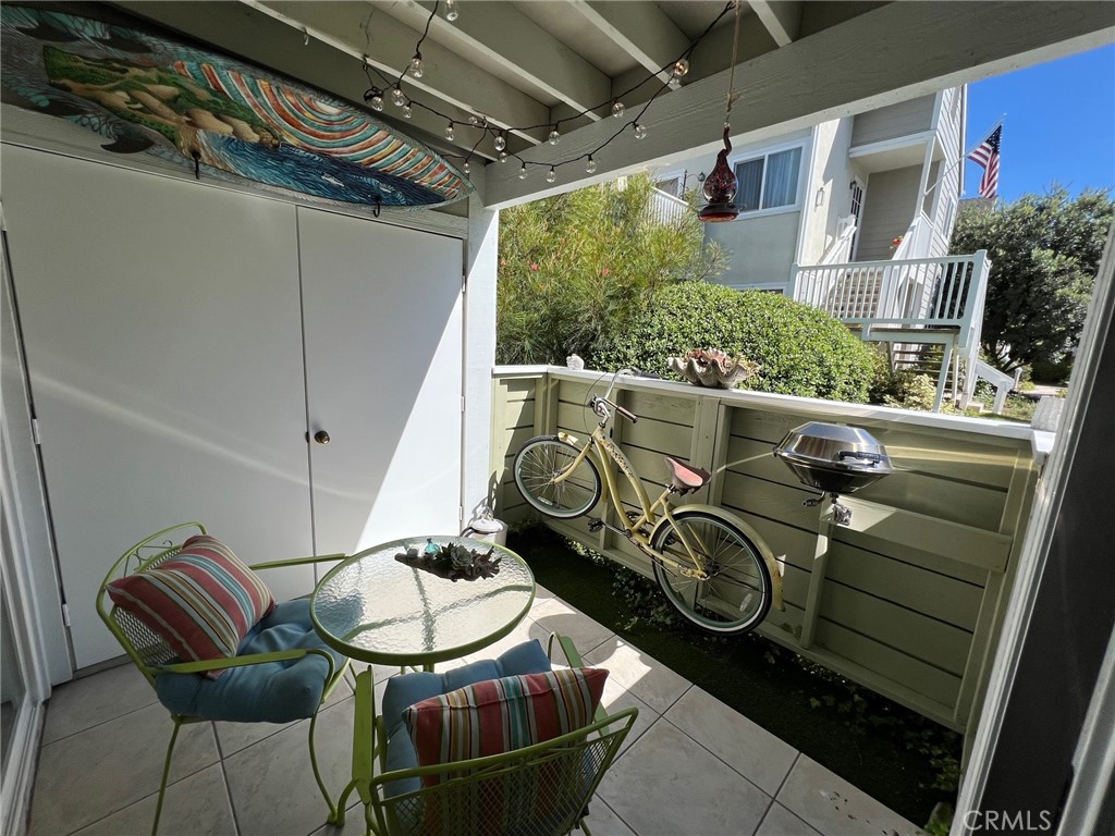 34026 Selva Road, Unit 70 Dana Point, CA 92629 - Photo 22 of 35 Patio with string lights