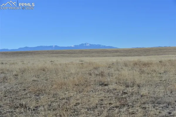 a view of an outdoor space and a mountain view