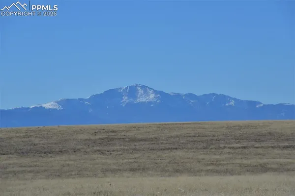 a view of an outdoor space and mountain view