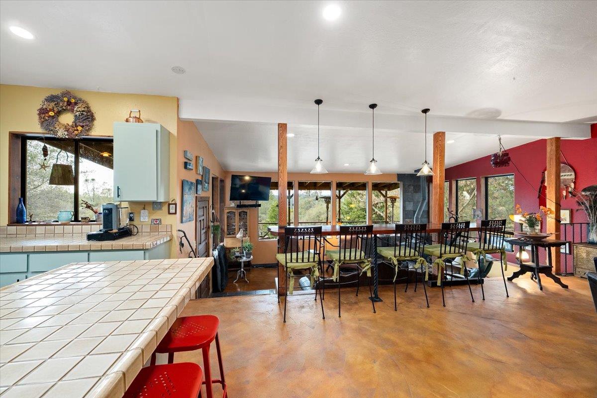 2244 Windmill Court Cool, CA 95614 - Photo 16 of 73 a living room with lots of furniture and painting on the wall