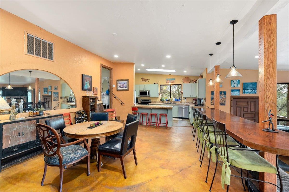 2244 Windmill Court Cool, CA 95614 - Photo 18 of 73 a view of a dining room with furniture and a table