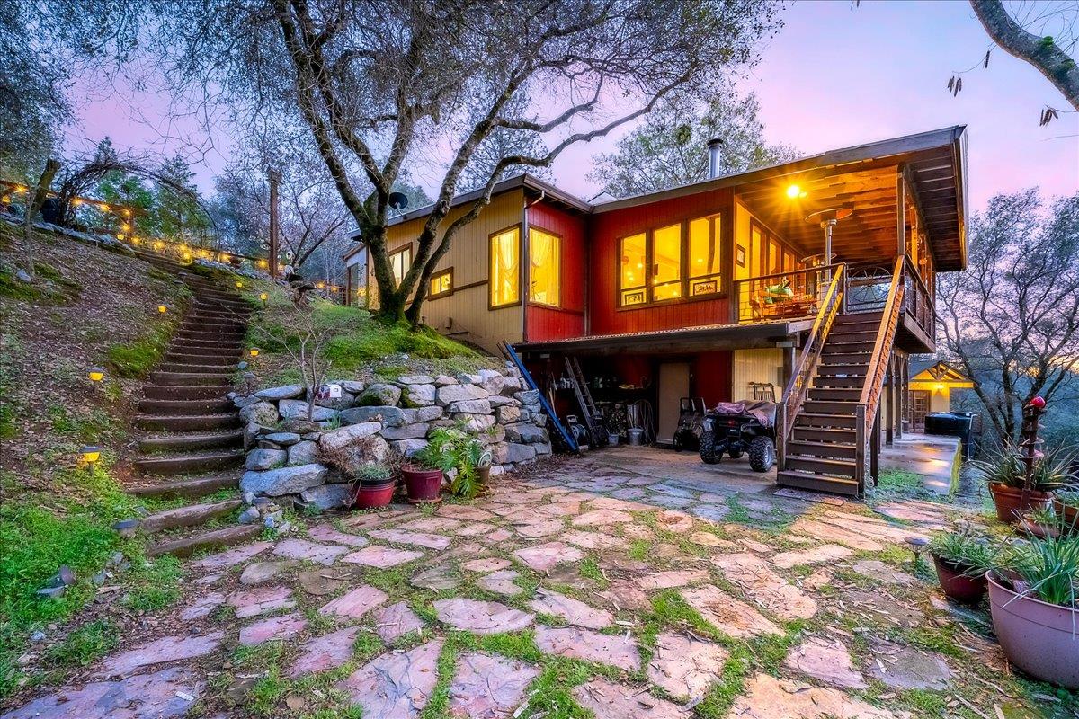 2244 Windmill Court Cool, CA 95614 - Photo 3 of 73 a view of a chairs and table in a backyard
