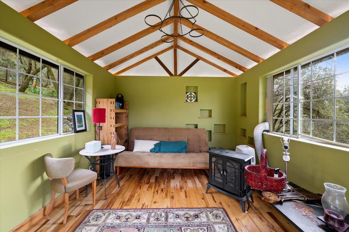 2244 Windmill Court Cool, CA 95614 - Photo 37 of 73 a living room with furniture and a window