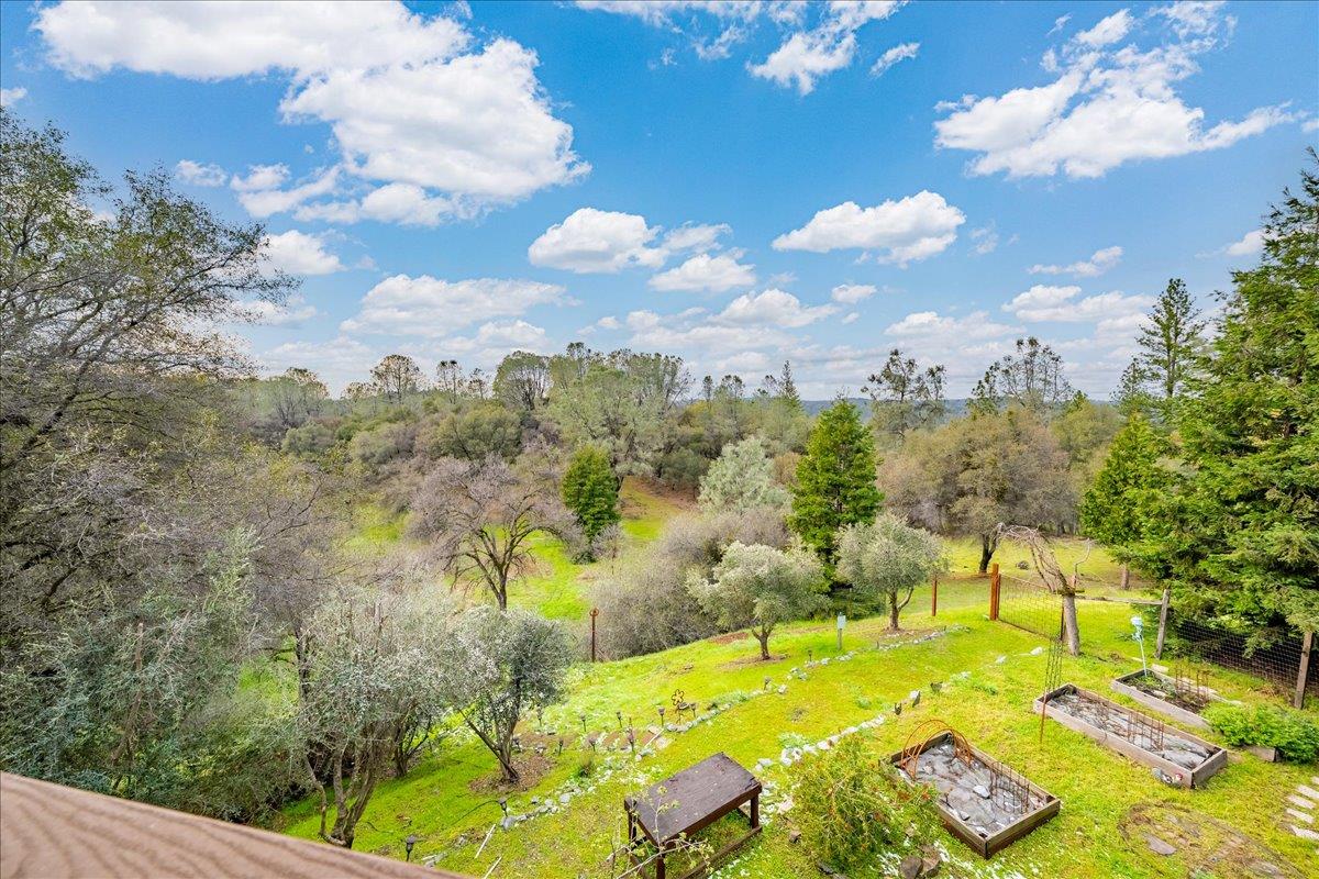 2244 Windmill Court Cool, CA 95614 - Photo 44 of 73 a view of a swimming pool with an outdoor seating