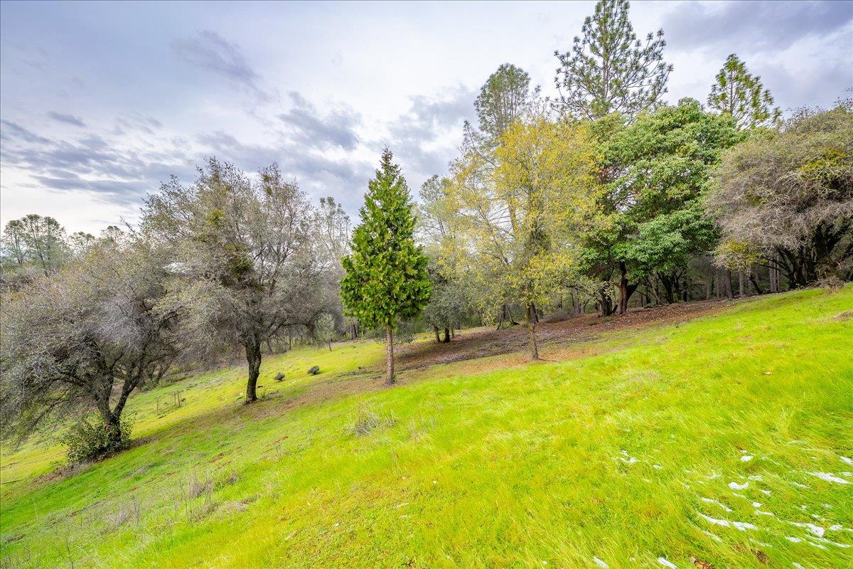 2244 Windmill Court Cool, CA 95614 - Photo 54 of 73 a view of a swimming pool with an outdoor space and seating area