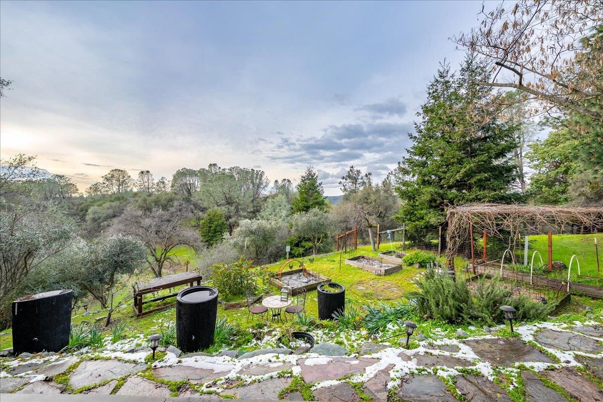 2244 Windmill Court Cool, CA 95614 - Photo 58 of 73 a view of a fire pit with a patio