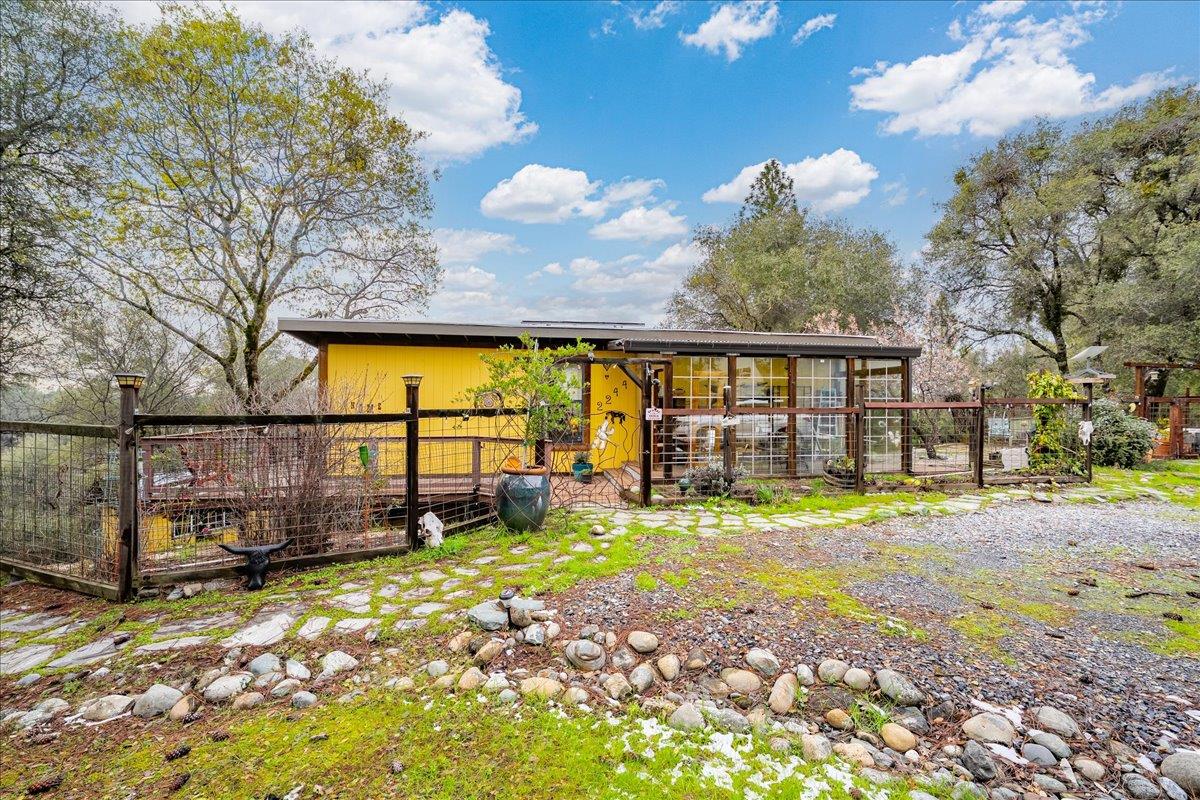 2244 Windmill Court Cool, CA 95614 - Photo 59 of 73 a view of a house with backyard and sitting area