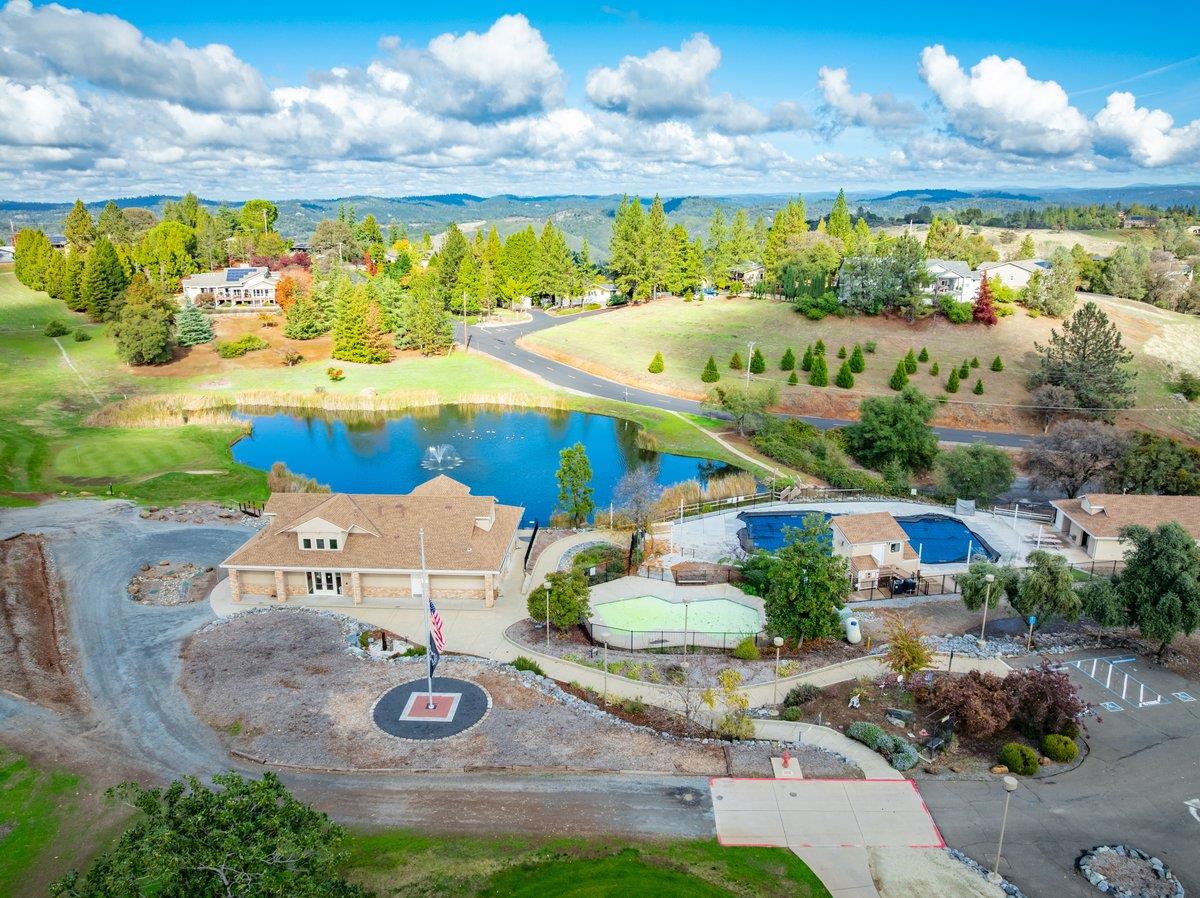 2244 Windmill Court Cool, CA 95614 - Photo 66 of 73 a view of an swimming pool and outside view
