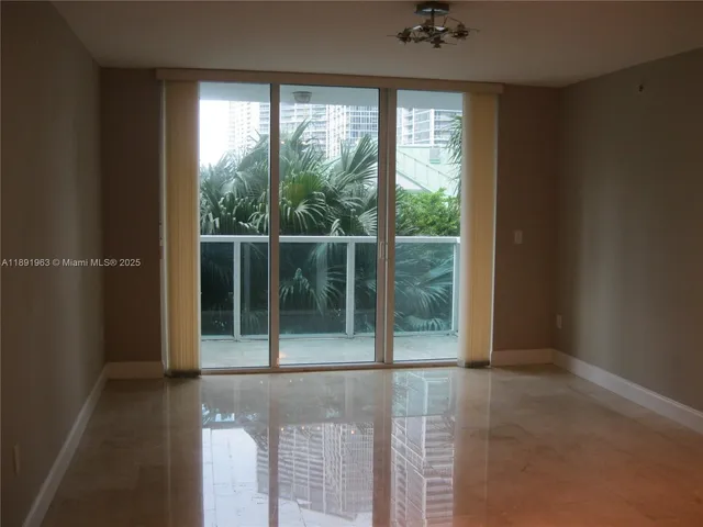 a close view of kitchen island a stove and a microwave