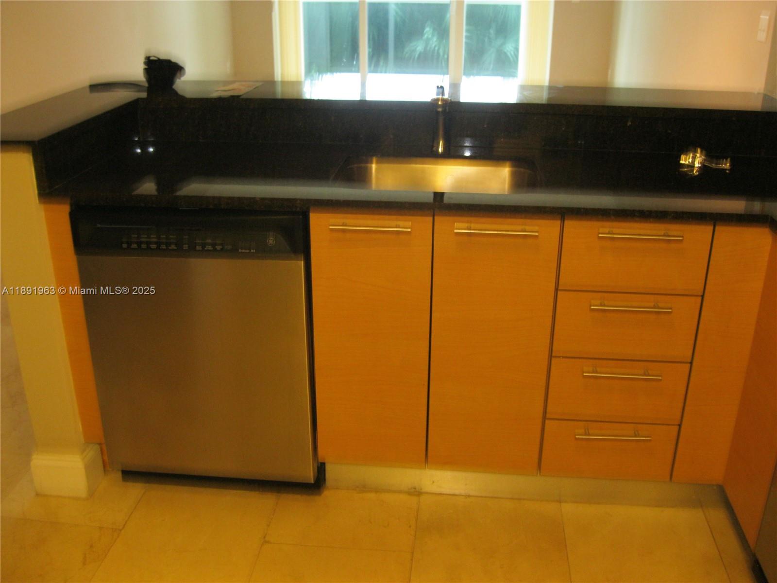 31 Southeast 5th Street, Unit 1210 Miami, FL 33131 - Photo 18 of 26 a close view of sink and tap