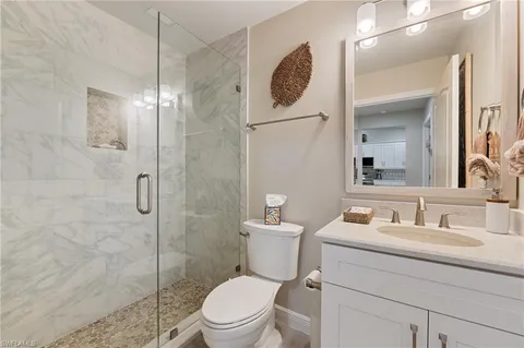 a kitchen with cabinets and appliances