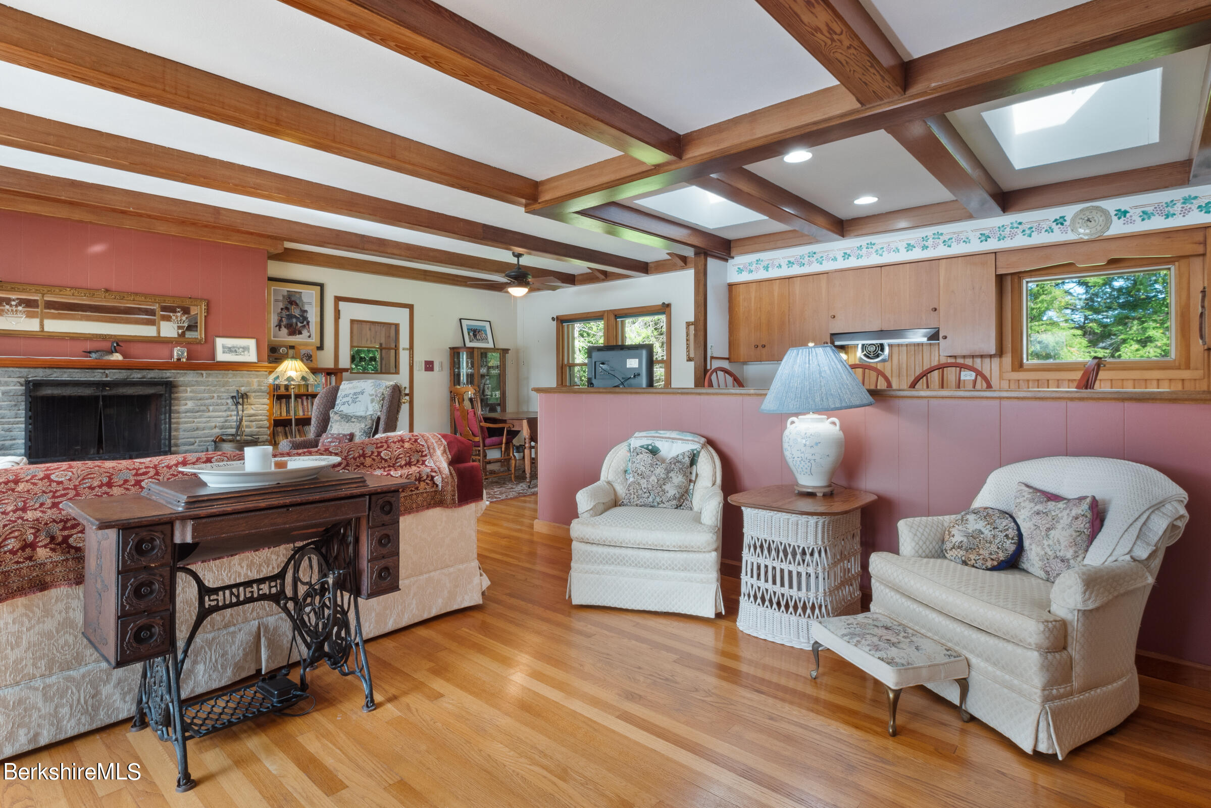 61 Bramble Lane Lenox, MA 01240 - Photo 41 of 42 a living room with furniture and a fireplace
