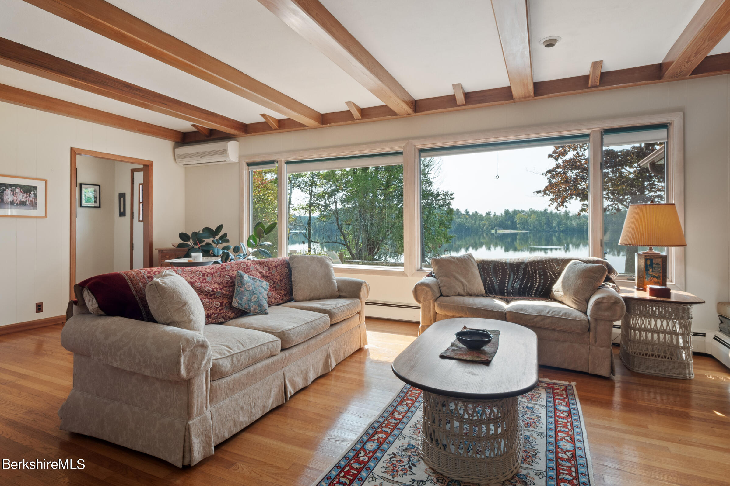 61 Bramble Lane Lenox, MA 01240 - Photo 24 of 42 a living room with furniture and a large window
