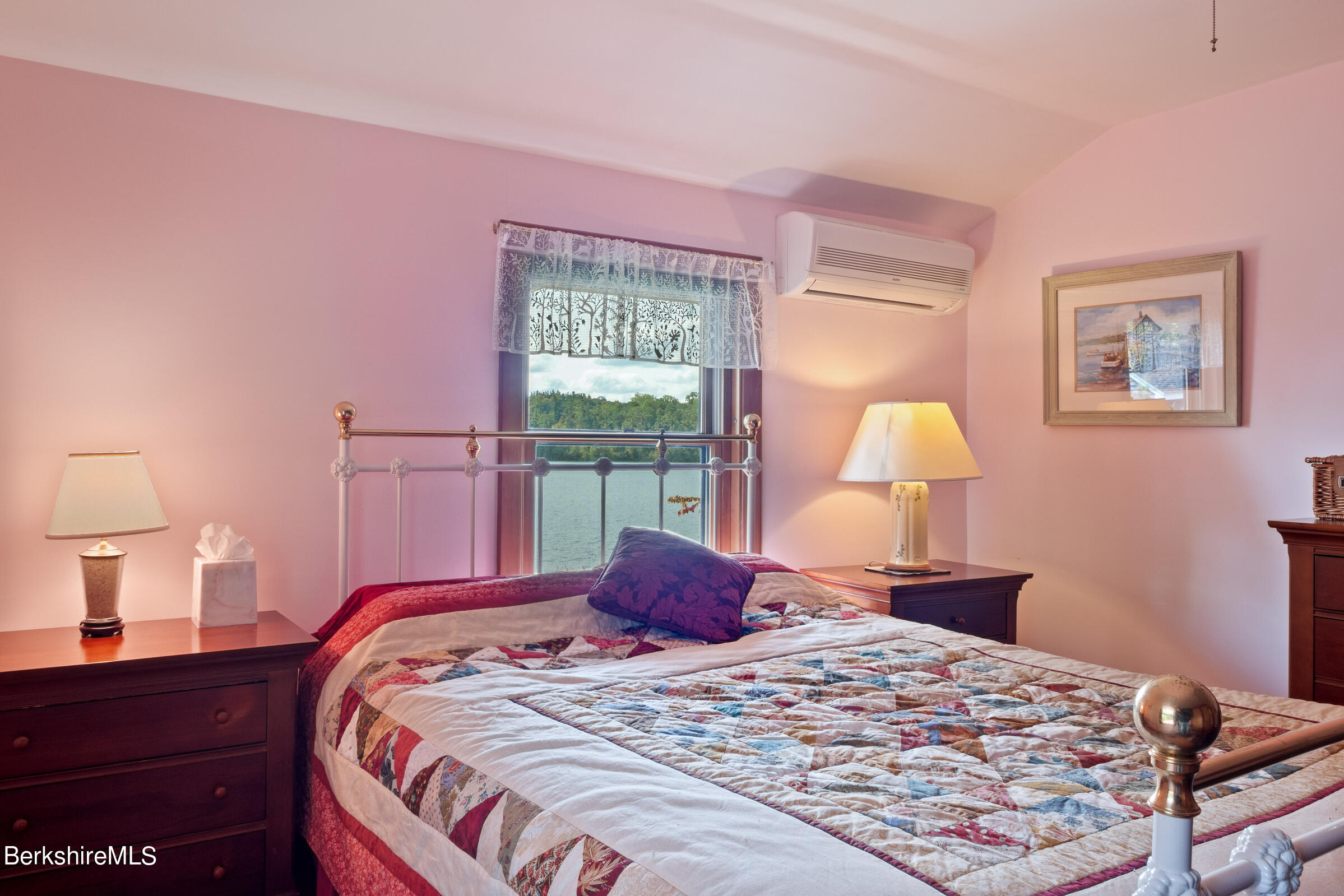 61 Bramble Lane Lenox, MA 01240 - Photo 34 of 42 a bedroom with a bed and a lamp