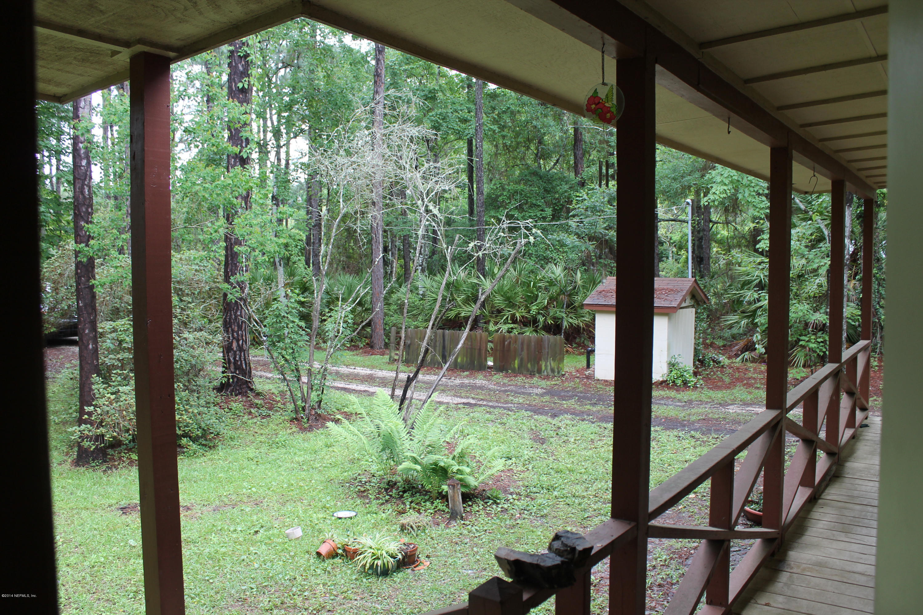 5700 Datil Pepper Road St. Augustine, FL 32086 - Photo 14 of 17 a view of a garden from a window