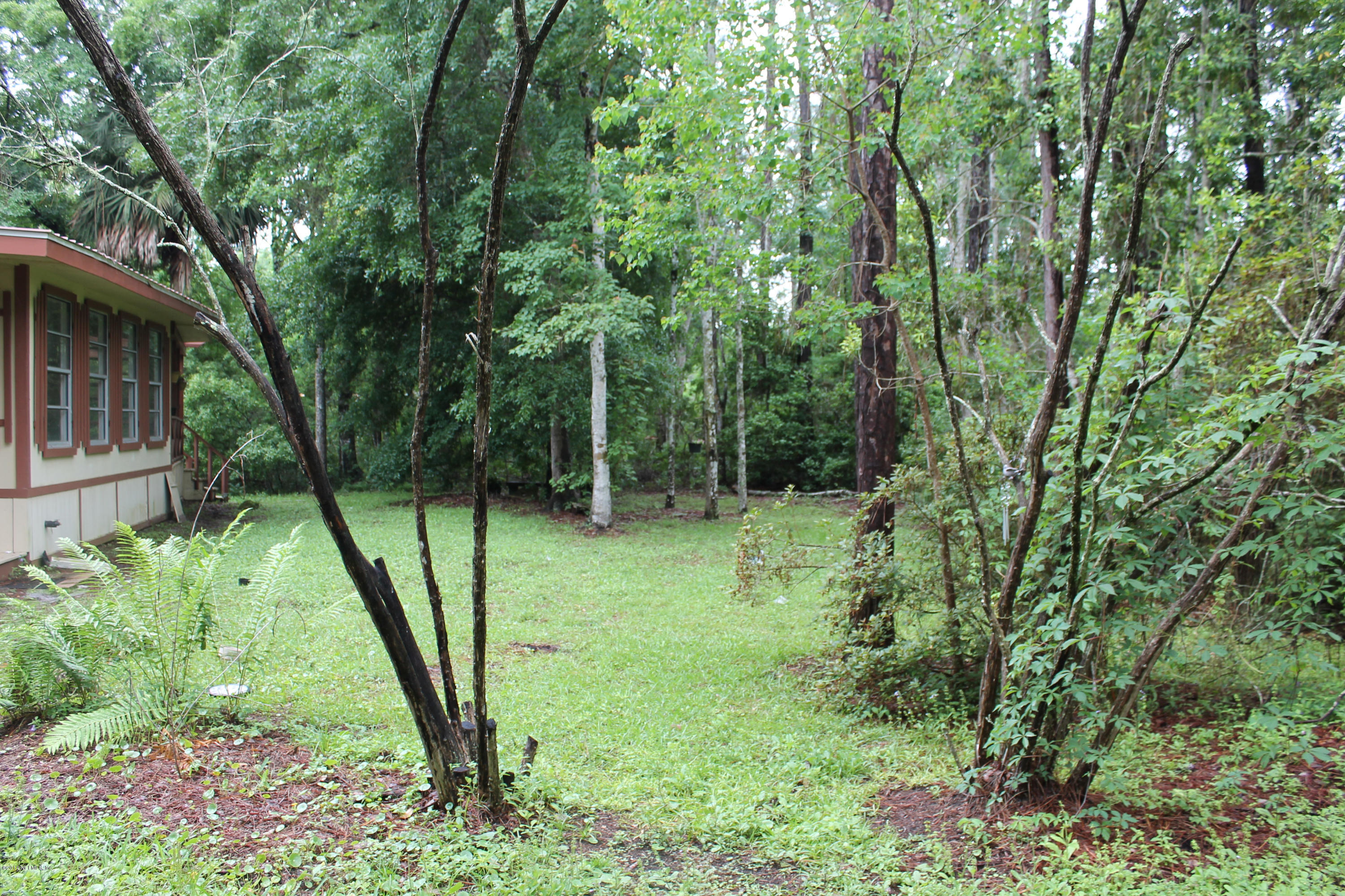 5700 Datil Pepper Road St. Augustine, FL 32086 - Photo 4 of 17 a view of a backyard