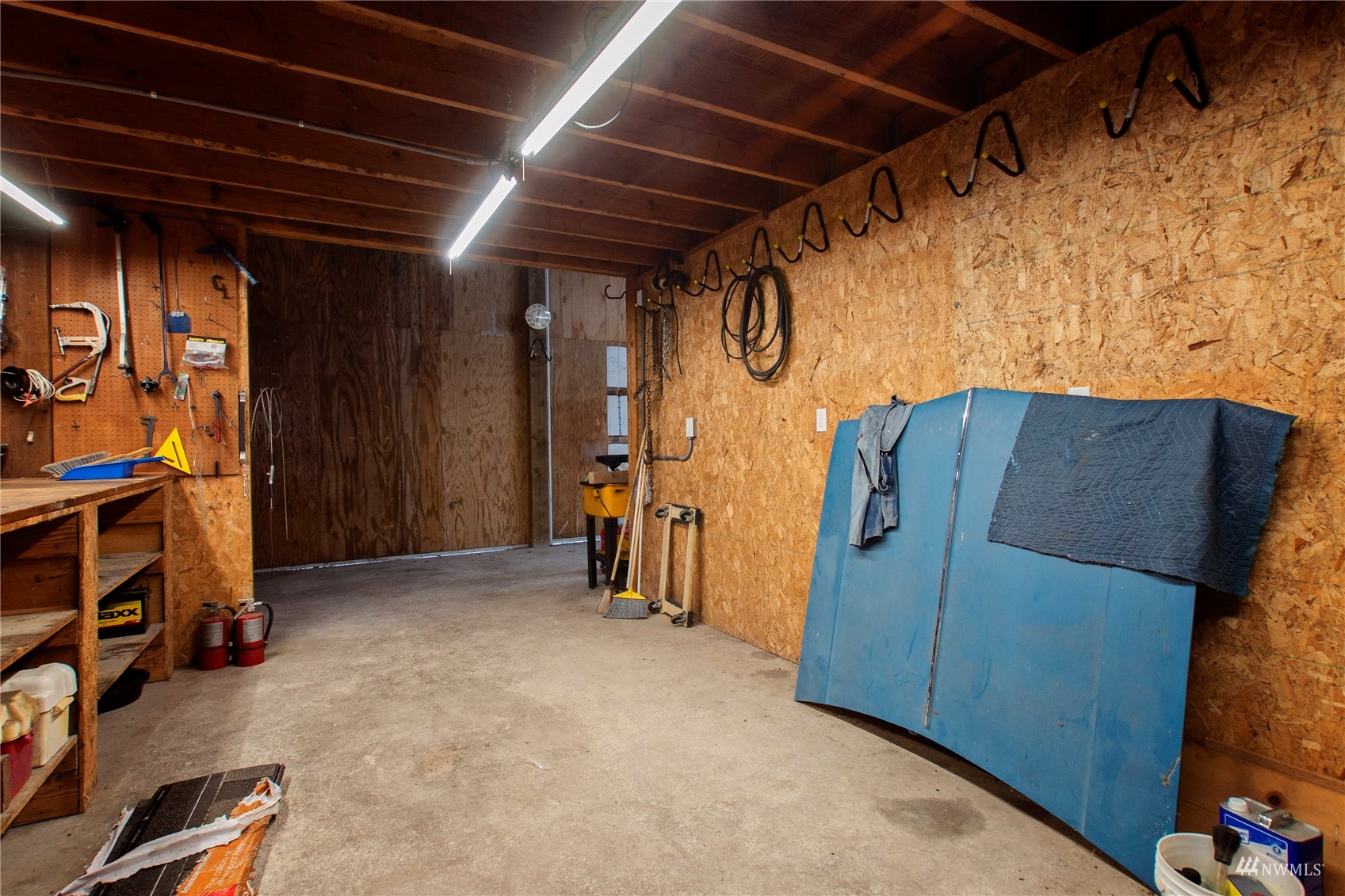 12128 Hunter Loop Road Southwest Rochester, WA 98579 - Photo 28 of 31 a view of storage and utility room