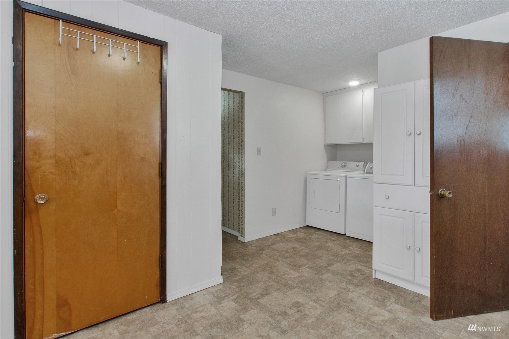 12128 Hunter Loop Road Southwest Rochester, WA 98579 - Photo 6 of 31 a view of a hallway to rooms