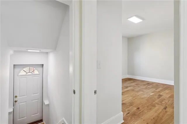 a view of hallway with mirror