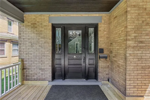 a view of a brick house with a door