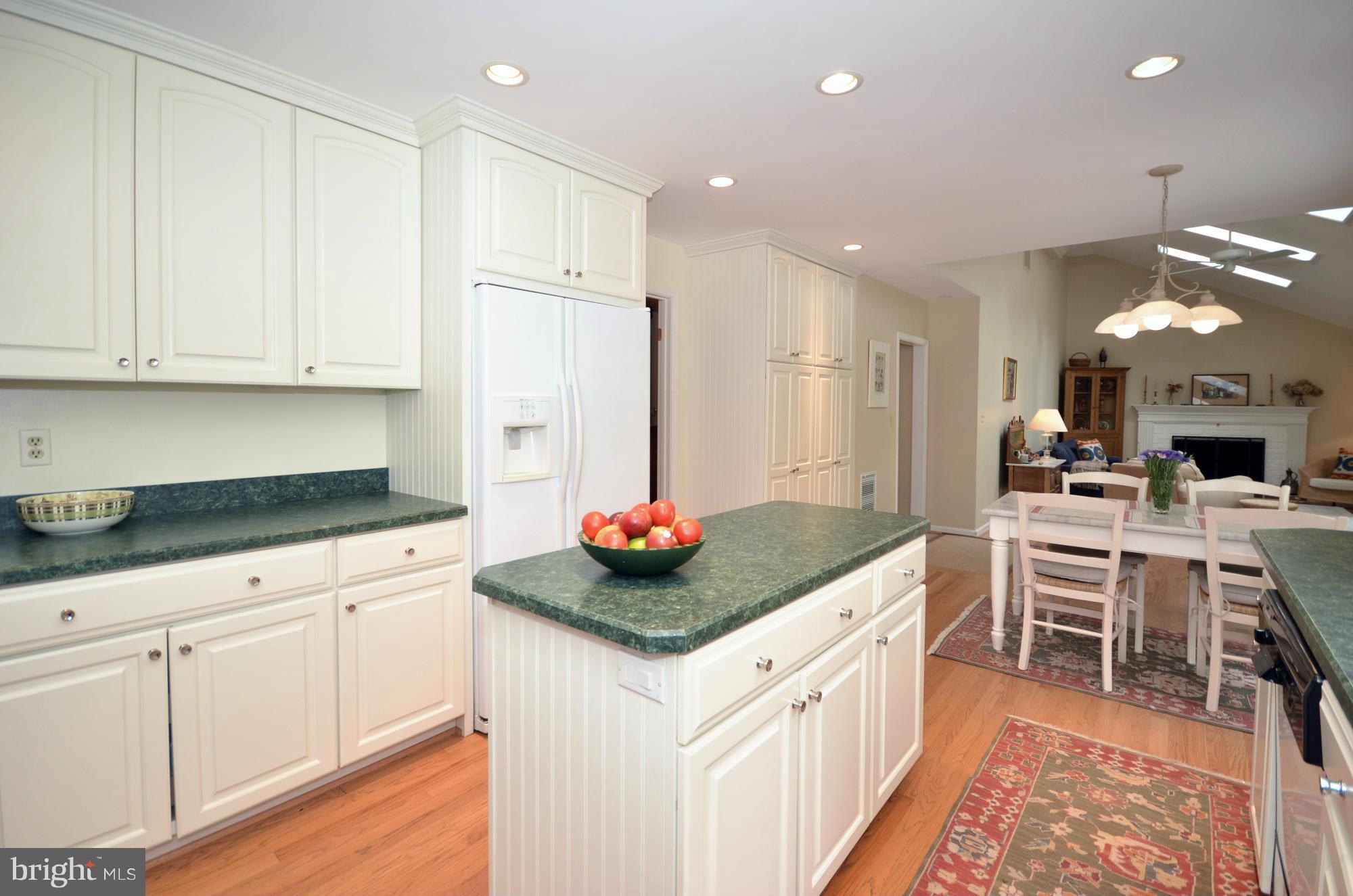 1909 Ridge Road Reisterstown, MD 21136 - Photo 8 of 29 a kitchen with white cabinets and sink
