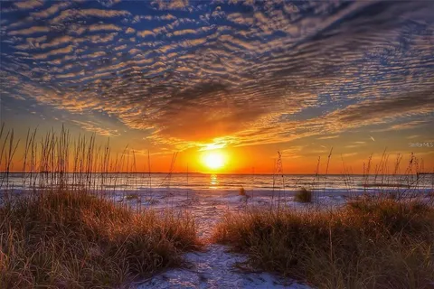a view of lake with green space